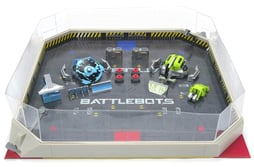 Photo of a bottlebots arena pro kit that includes two robots, two remotes and an arena.