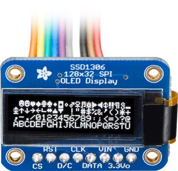 Photo of an Adafruit mono 128 by 32 SPI OLED graphical display.