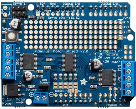 Photo of an Adafruit servo motor/stepper shield for Arduino.