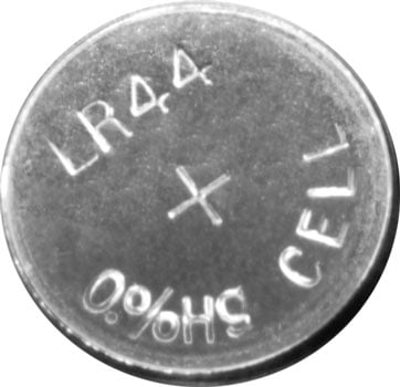 Photo of a LR44 A76 alkaline button cell battery.