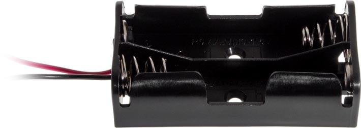 Side photo of a flat battery holder that holds two AA battery cells.