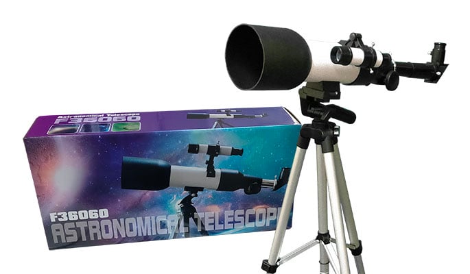 360mm telescope next to colourful box
